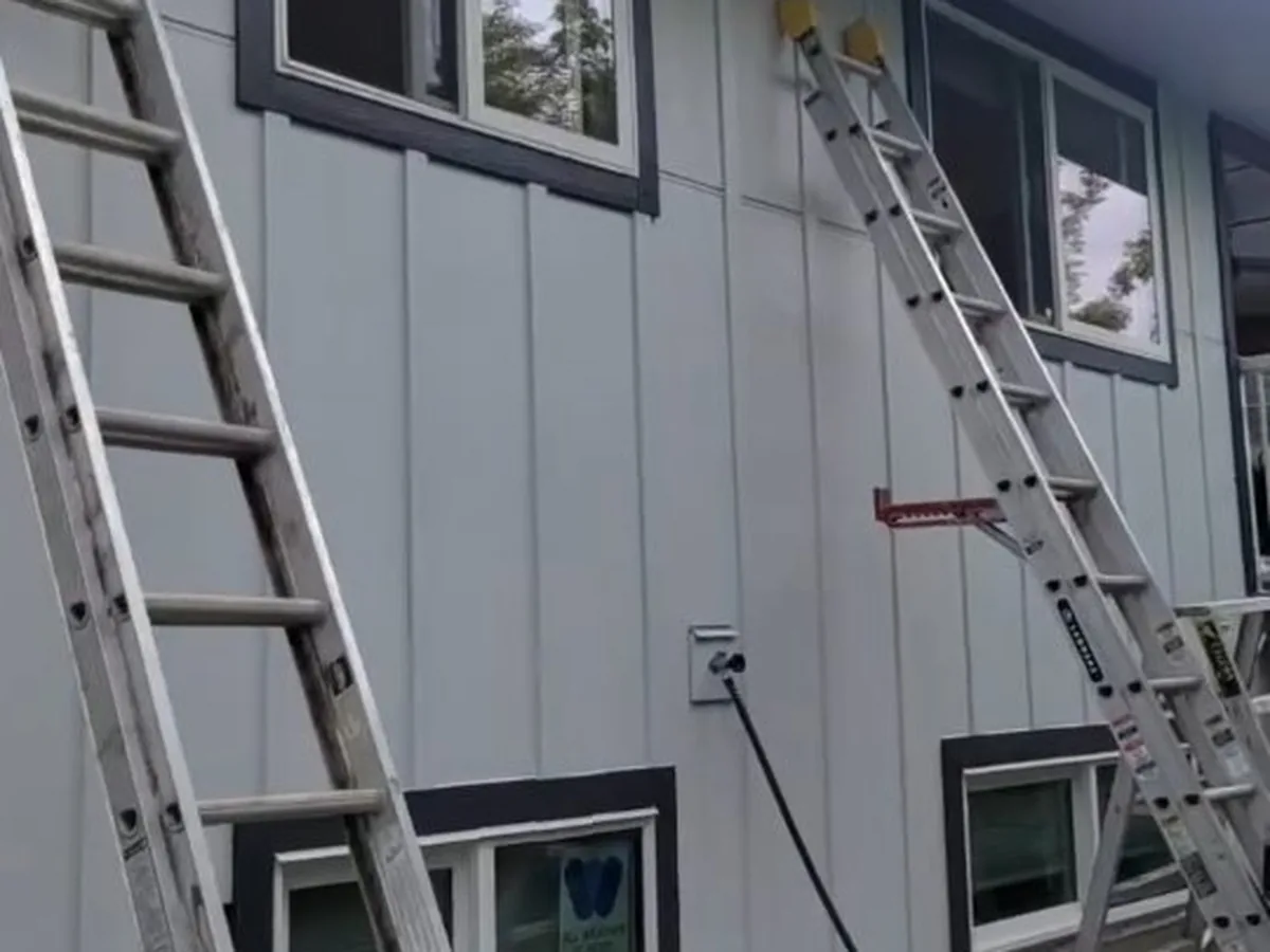 Mid-job exterior siding install on a Vernon home